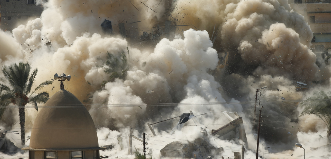 Smoke rises after a house is blown up during a military operation by Egyptian security forces in the Egyptian city of Rafah, near the border with southern Gaza Strip October 29, 2014. At least 33 Egyptian security personnel were killed on Friday in the Sinai Peninsula bordering Israel and Gaza, in an attack on a checkpoint that bore the marks of assaults claimed by Egypt's most active militant group Ansar Bayt al-Maqdis. Egypt's President Abdel Fattah al-Sisi said on Saturday the military would respond with measures in the border area where a buffer zone is likely to be expanded to pursue militants and destroy tunnels used to smuggle weapons and fighters. REUTERS/Suhaib Salem 