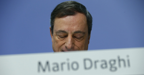 European Central Bank (ECB) President Mario Draghi looks down during an ECB news conference December 4, 2014, for the first time in the ECB's new 1.3 billion euro headquarters in Frankfurt. REUTERS/Ralph Orlowski 