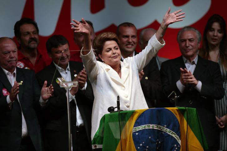 Dilma Roussef in a 2014 photo celebrating the electoral results that decreed her re-election as president. On 31 August 2016 she was removed from office following impeachment procedures.