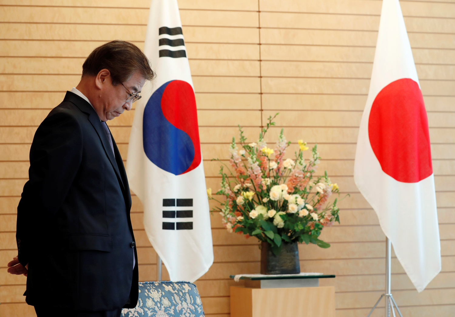 Il capo del servizio di intelligence nazionale della Corea del Sud, Suh Hoon, a Tokyo, Giappone, 13 marzo 2018. REUTERS/Kim Kyung-Hoon/Pool