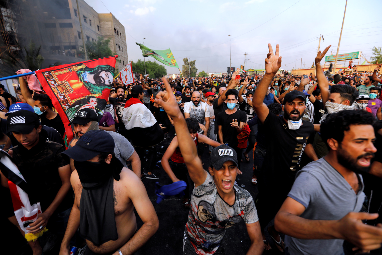 I manifestanti protestano contro la disoccupazione, la corruzione e i servizi pubblici, a Baghdad, Iraq, 2 ottobre 2019. REUTERS/Thaier al-Sudani