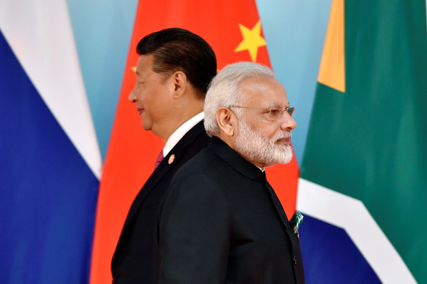 Il Presidente cinese Xi Jinping e il Primo Ministro indiano Narendra Modi durante un vertice BRICS in Cina. REUTERS/Kenzaburo Fukuhara